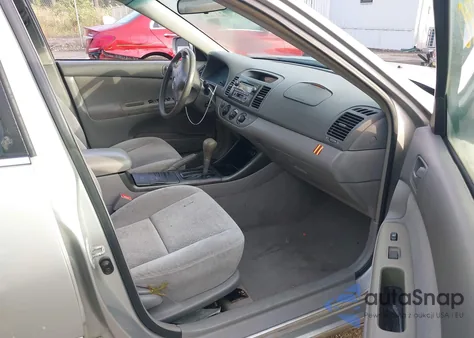 2003 Toyota Camry Le z USA, uszkodzony, nr VIN 4T1BF32K23U043478